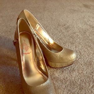 Size 9 Baby Phat platform Gold shoes